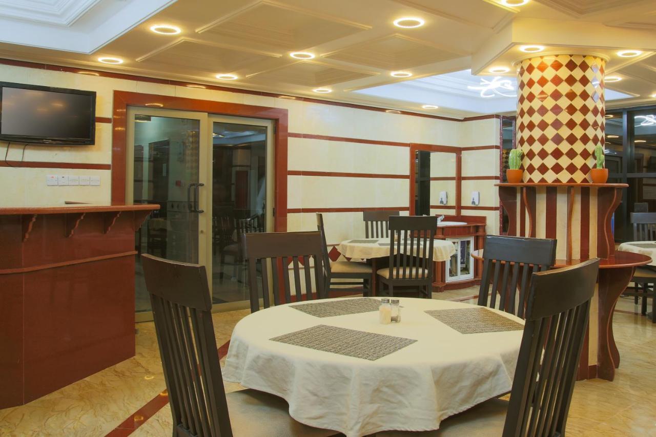 Sleep Inn Hotel - City Centre Дар-эс-Саламе Экстерьер фото